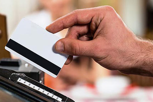 card being swiped in a machine
