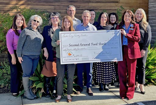 Presentation of a large check donation to the Second Harvest Food Bank
